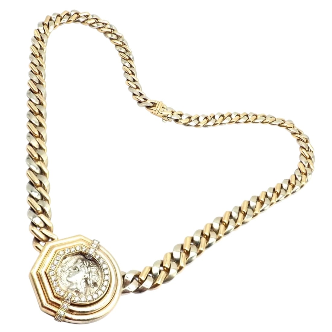Bvlgari Bulgari 18k Yellow White Gold Diamond Monete Antique Coin Link Necklace: The Bvlgari Bulgari 18k Yellow And White Gold Diamond Monete Antique Coin Link Necklace is a masterpiece combining history and luxury. Featuring authentic antique coins framed in 18k yellow and white 