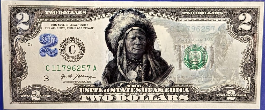 $2 Running Antelope Commemorative: A Modern Tribute to a Classic American Banknote Design This listing offers a unique commemorative and collectible piece of American currency. It is a commemorative Two Dollar banknote, a genuine