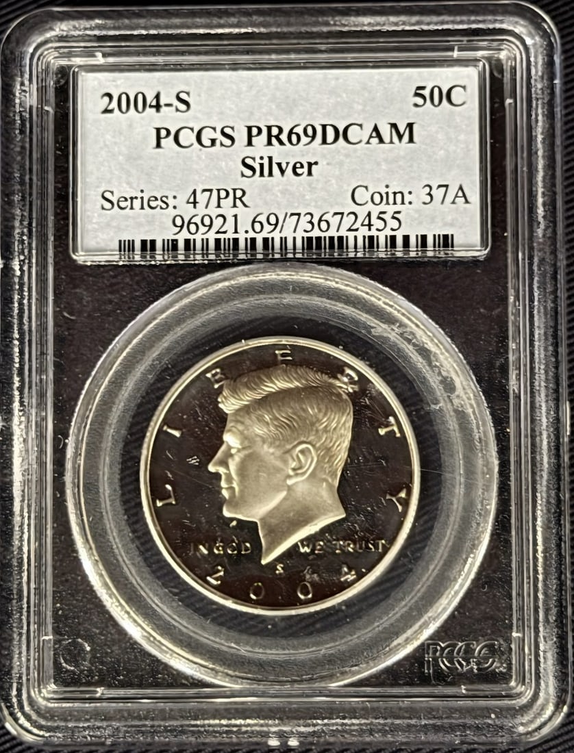 2004-S Half PR69 - PCGS Silver DCAM: A Modern Silver Gem: The 2004-S Proof Kennedy Half Dollar This listing offers an exceptional opportunity to acquire a stunning example of modern American numismatics. It is a 2004-S Kennedy Half