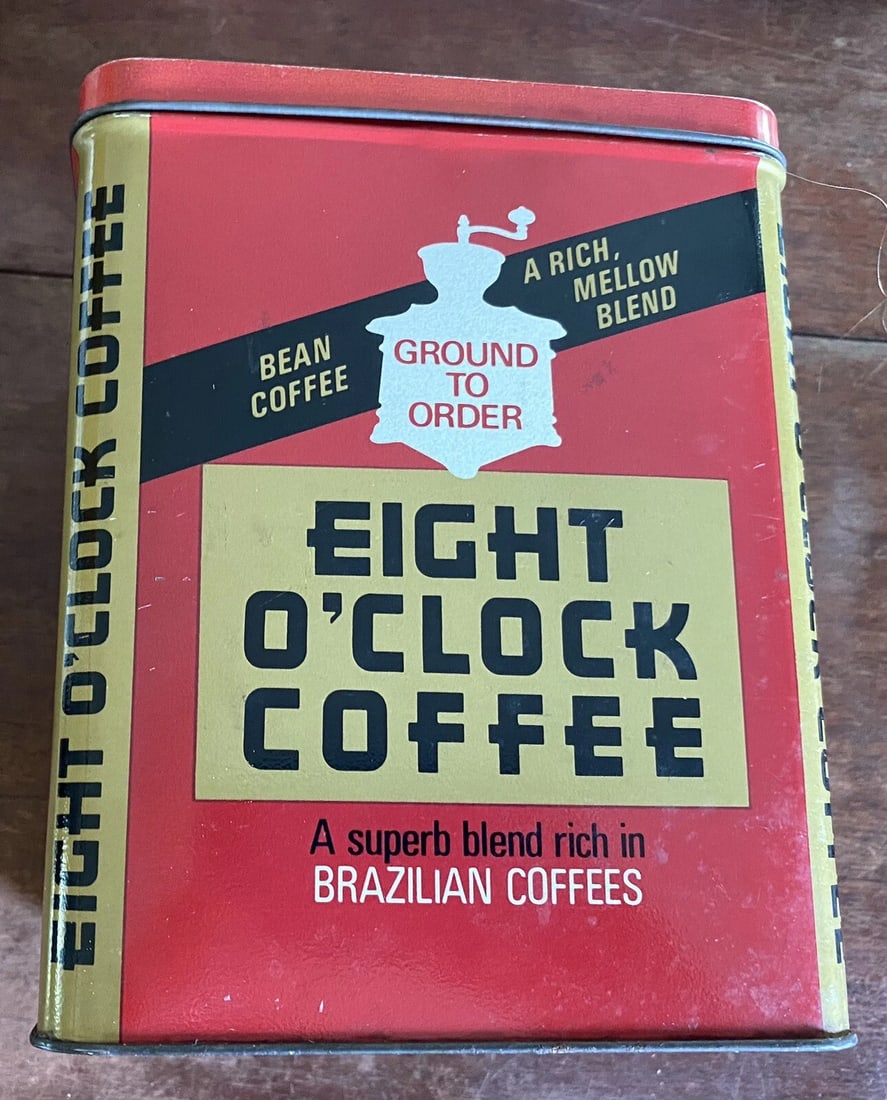 VINTAGE KITCHEN 7 1/2" HIGH Original EIGHT O'CLOCK COFFEE TIN CAN *EMPTY* VG: VINTAGE KITCHEN 7 1/2" HIGH Original EIGHT O'CLOCK COFFEE TIN CAN *EMPTY* VG. With original lid, fits well. Clean condition. Bright red black and white coloring. Measures 7.5” H x 6 1/4” x