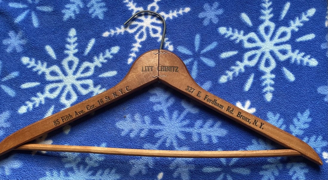 Vintage Wooden Hangers New York NYC Clothier Uniforms 225 Lafayette street: This vintage wooden clothes hanger is branded as Litt Chinitz. Two addresses are on the hanger, one in NYC and the other in Bronx, NY. It is a light brown color and designed for adult unisex use. The 