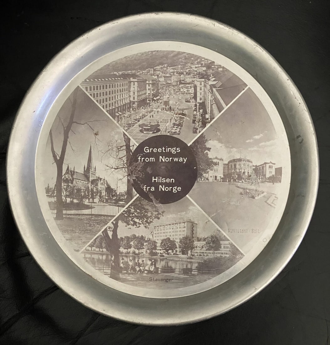 VINTAGE Metal Souvenir Plate from Norway Photographs of Parliament & Other Sites: Vintage Souvenir Tray from Norway Features Photographs of Important Sites: Parliament in Oslo, Stavenger, The Cathedral of Stondheim, Centre of Bergen. Metal Tray Measures 11" Diameter Used, some scra