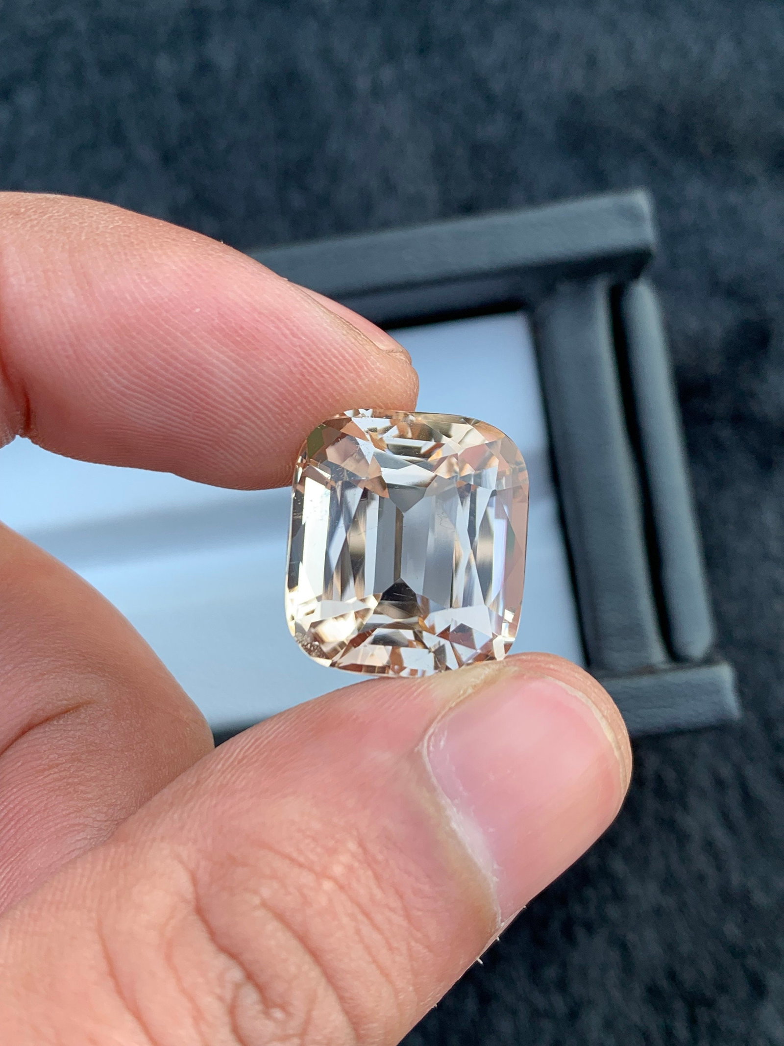 24.70Ct Sherry Topaz Gemstone: Faceted Cushion Cut: Gemology: * Weight : 24.70 carat * Dimension :22*15*11 mm * Color: Sherry * Clarity : Eye Clean * Shape : Cushion Cut * Hardness : 8 * Mineral Class : Silicate * Luster: Vitreous * Associated month: