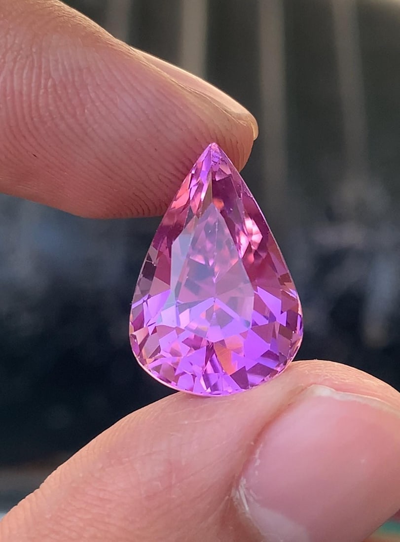 Natural Pink Kunzite Pear Cut Gemstone For Necklace - 16.365 Carat: Weight : 16.365 carat Dimensions : 18.8*12.6*11.8 mm Color: Pink Shape : Pear Cut Clarity : Eye Clean Hardness : 6.5 - 7 Mineral class: Spodumene SKU : V Reserve: $480.00 Shipping: Domestic: