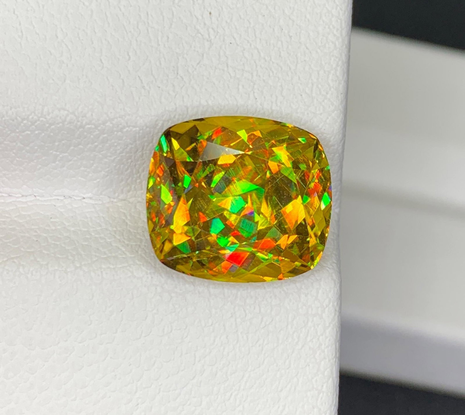 Lustrous Sphene Titanite Fancy Cushion Gemstone: 8.48 Carat Multi Color Titanite, June Birthstone: Highlights Supplies for making crafts Materials: Gemstone: Sphene Weight : 8.48 cts Dimensions : 12 * 10.8 * 7.9 MM Color : Multi Color Shape : Cushion Clarity : Clean Treatment : Natural Origin : Afr