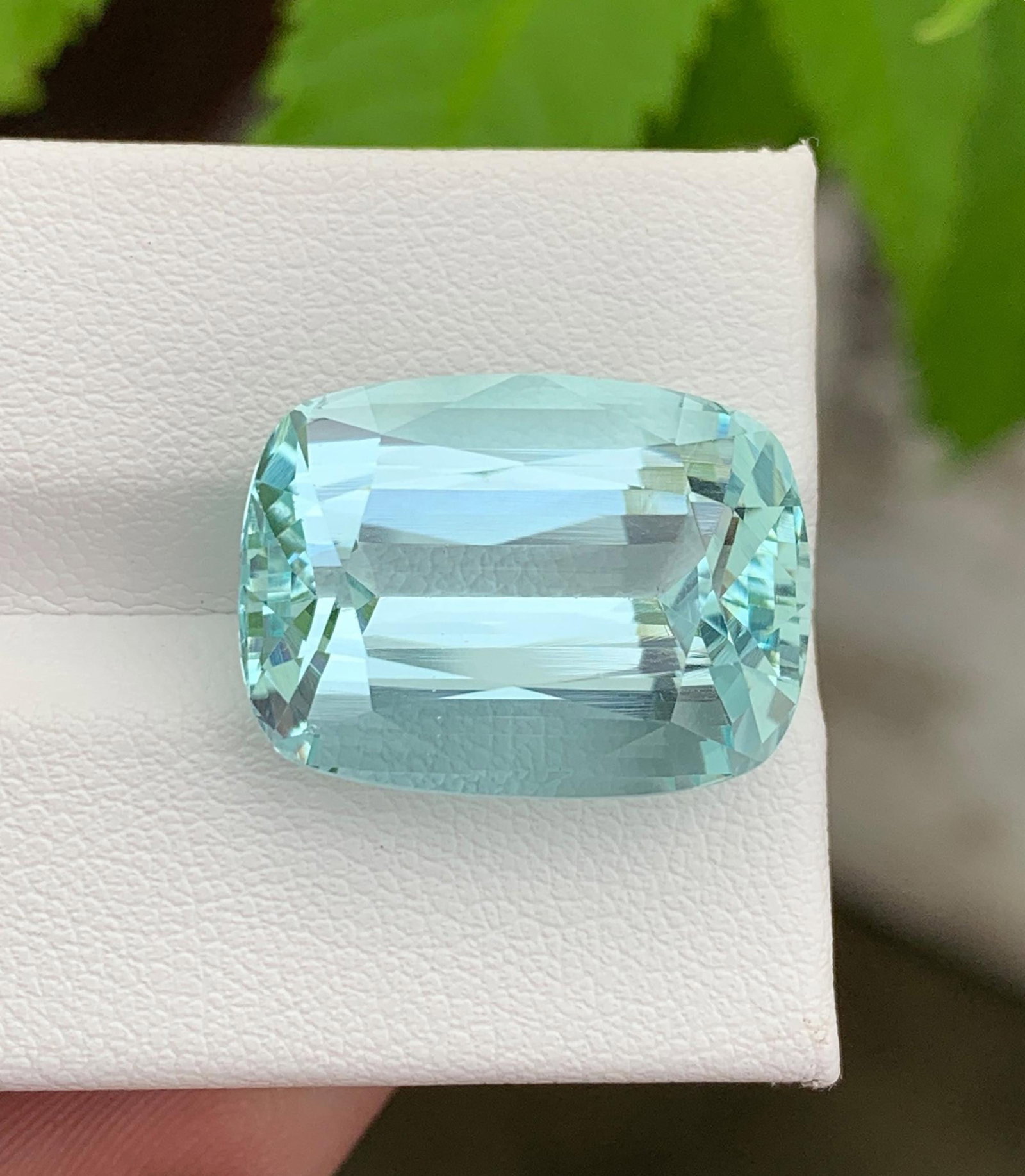 Natural Pakistan Aquamarine Gemstone 20.00 Carat Cushion Cut - Loose Sky Blue Aquamarine for Ring: Discover the breathtaking beauty of this Natural Pakistan Aquamarine weighing an impressive 20.00 carats. Expertly fashioned in an elegant Cushion Cut, this gemstone showcases a captivating sky-blue c