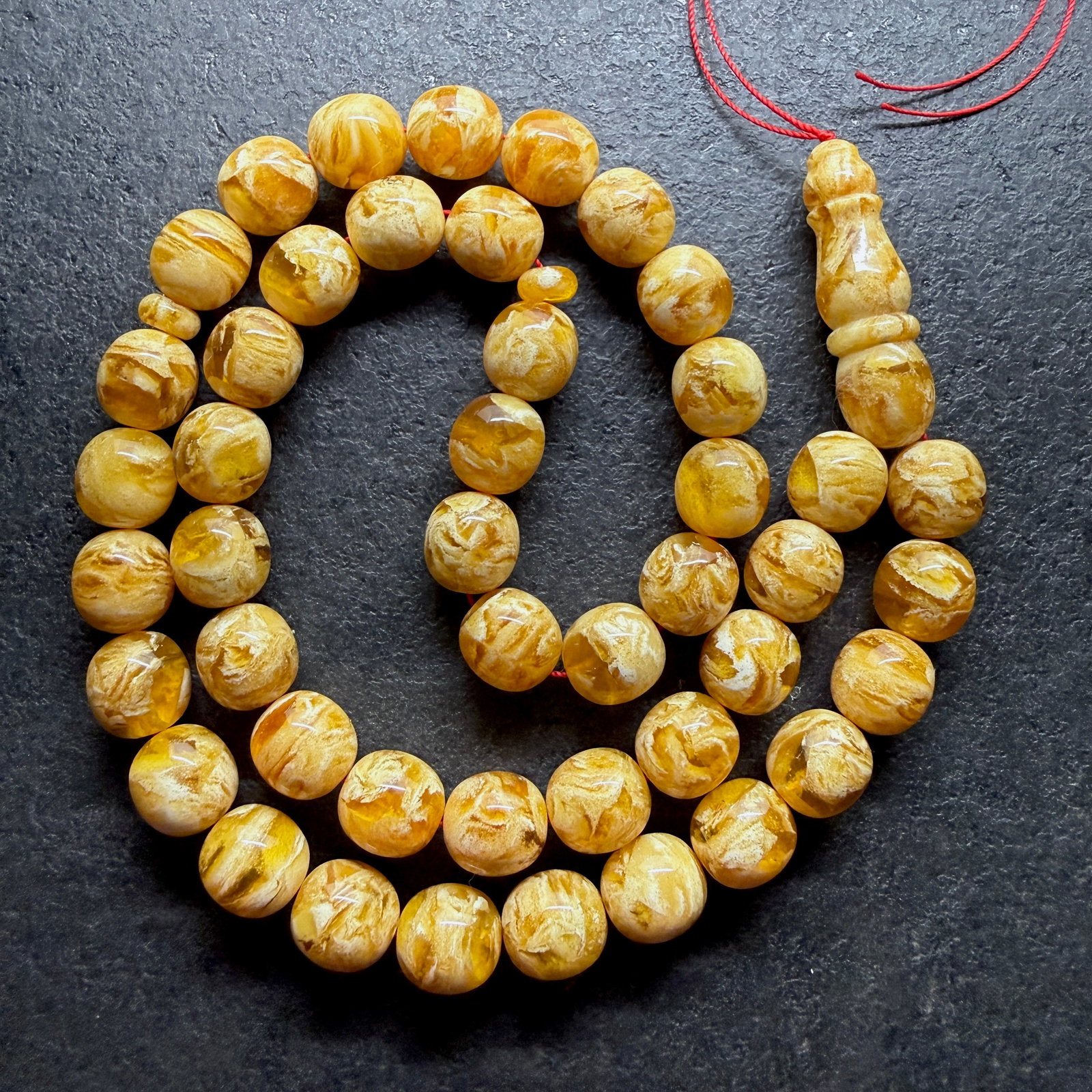 Amazing Amber Tesbih made from Round Amber beads: Title:Amazing Amber Tesbih made from Round Amber beads Metal:None Gemstone:Reconstituted Amber Weight:68.52 g Size:13.5x13mm Made of:(Reconstituted Amber or Whole Stone):Reconstituted Amber Additional