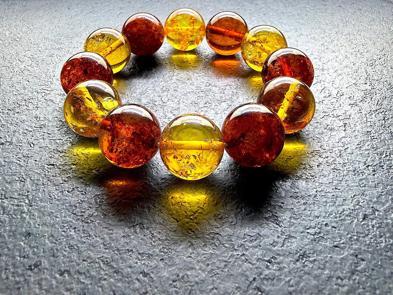 Alluring Amber Bracelet: Title:Alluring Amber Bracelet Metal:None Gemstone:Reconstituted Amber Weight:38.9 g Size:18mm Made of:(Reconstituted Amber or Whole Stone):Reconstituted Amber Additional information:Alluring Amber Bra