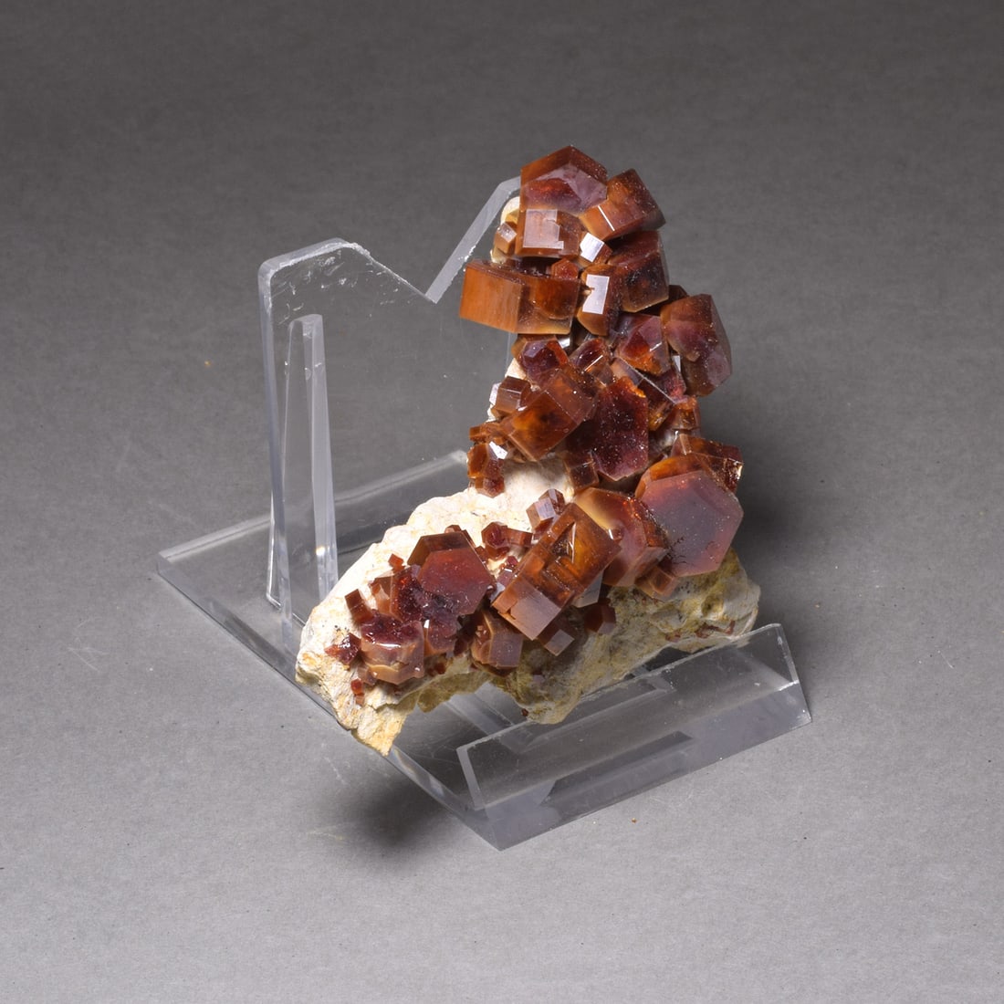 Fine Vanadinite Cluster on matrix: Title: Fine Vanadinite Cluster on matrix Origin: Morocco Size: 6 x 5.5 x 3 cm Description: Fine vanadinite with very shiny red crystals. From the 2019 find. 84 g Reserve: $180.00 Shipping: Domestic: