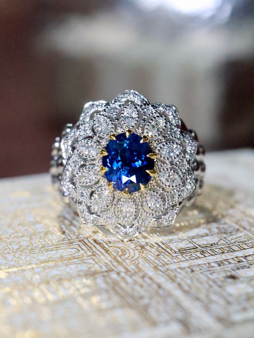 Platinum Natural Sapphire Ring: Title: Platinum Natural Sapphire Ring Description: This ring perfectly combines modern and classical styles, with the luster of platinum complementing the deep color of the sapphire. Its elegant