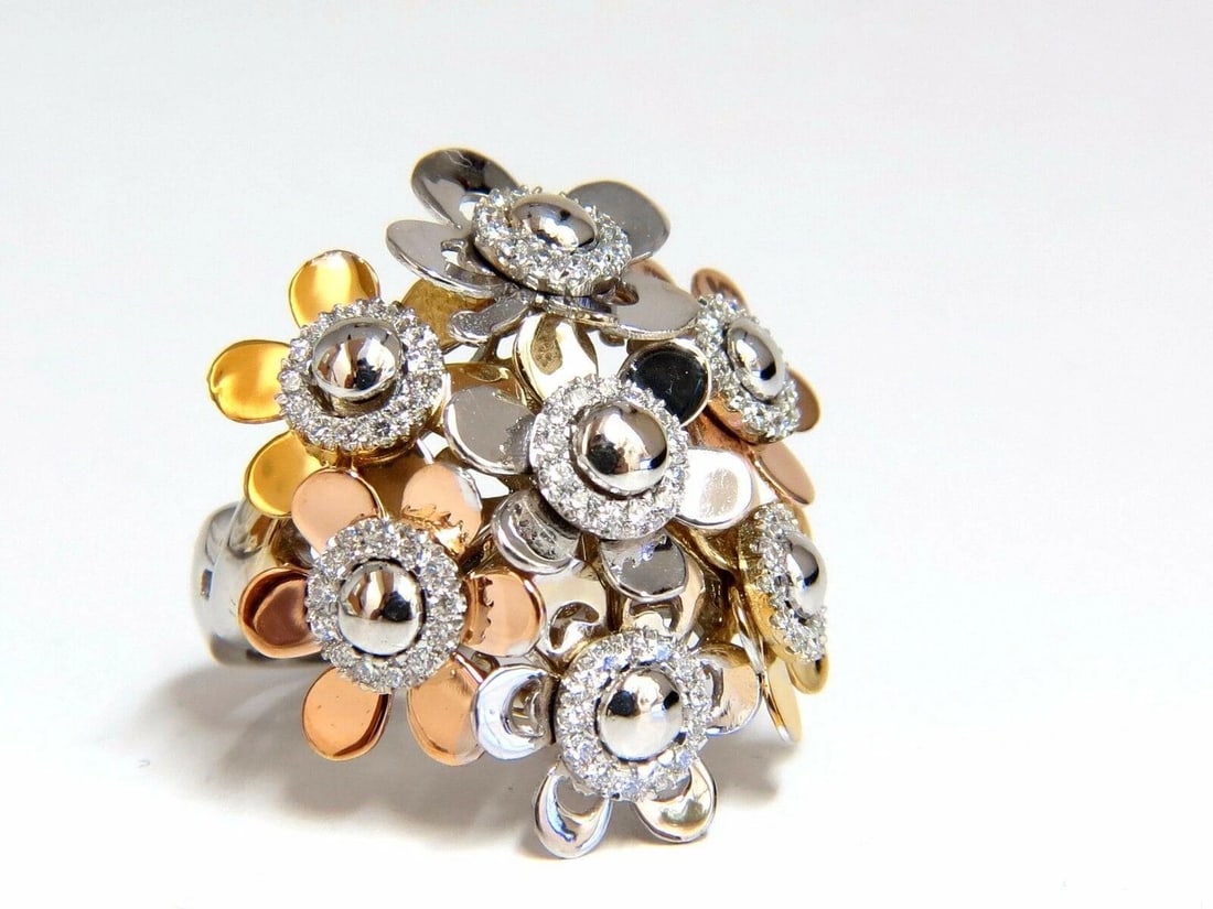 .86ct Natural Diamonds Floating Flower Petals Ring 18kt Cocktail Bundle 11186: Title: .86ct Natural Diamonds Floating Flower Petals Ring 18kt Cocktail Bundle 11186 $4,500.00 PRODUCT DESCRIPTION Floating Petals Mod .86ct. Round diamonds ring. Petals move & turn slightly. Nicely