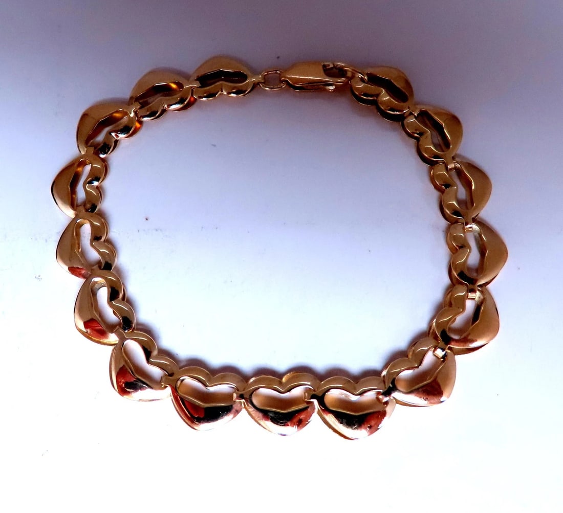 Heart Linked Bracelet Mod Deco 14kt 8mm 12449: Title: Heart Linked Bracelet Mod Deco 14kt 8mm 12449 $1,200.00 PRODUCT DESCRIPTION Deco Link Heart Bracelet Heart: 8mm 7.2 grams 7 inch long Reserve: $1,104.00 Shipping: Domestic: Free shipping to