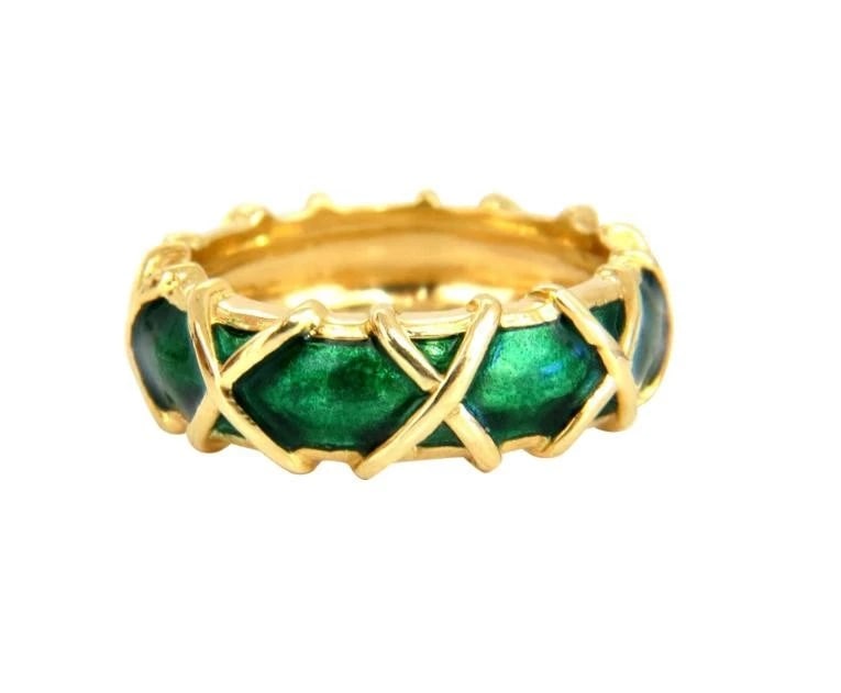 Vintage 18 Karat Gold Eternity X Green Enamel Ring 45441: Title: Vintage 18 Karat Gold Eternity X Green Enamel Ring 45441 $1,400.00 PRODUCT DESCRIPTION "X" Eternity Vintage Endless Ring Intricate Green enamel details. 6.5mm wide 18kt. yellow gold 7.4 grams S