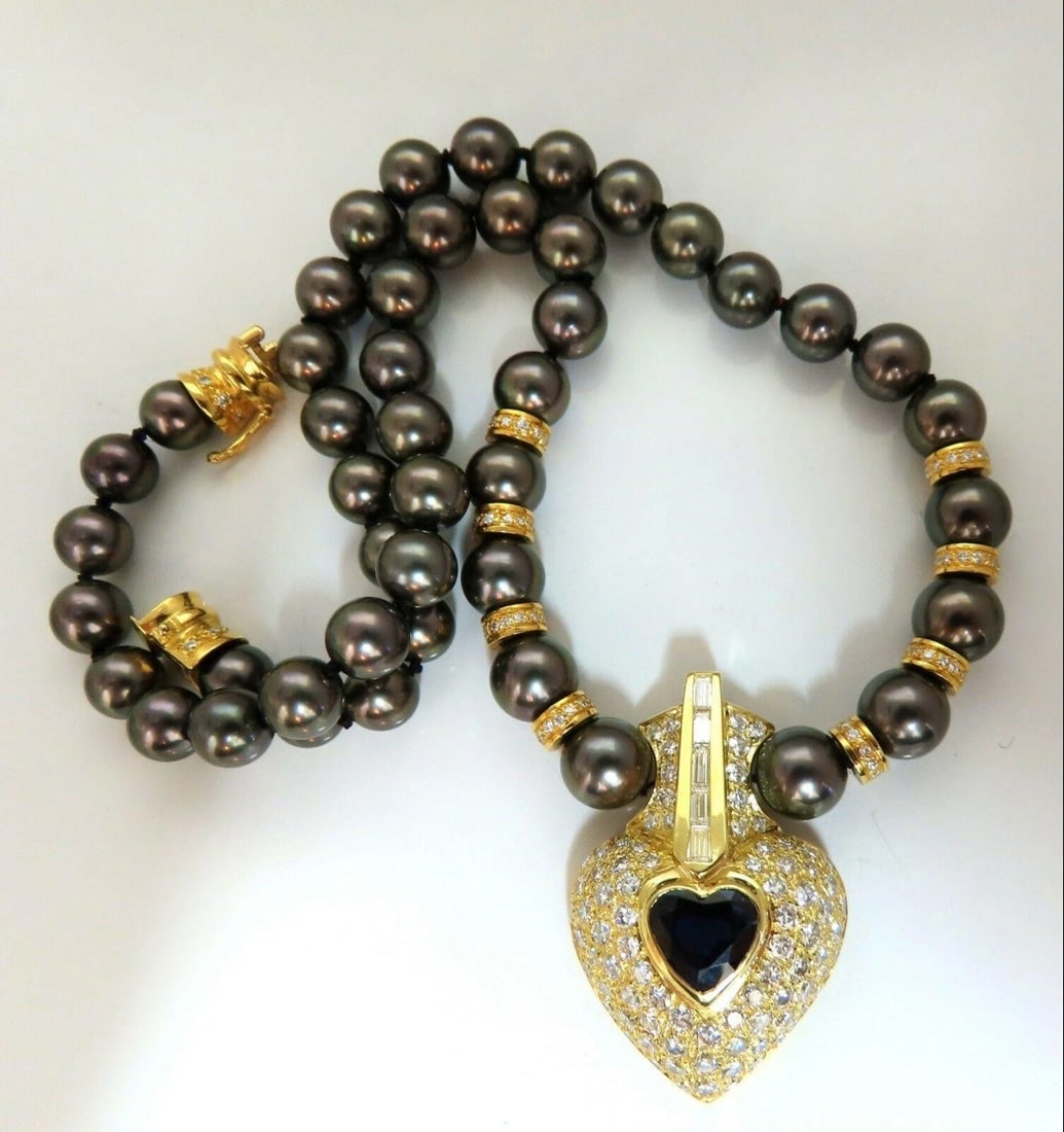 6.40ct Natural Heart Blue Sapphire Diamonds Tahitian Pearls Necklace 18 karat: Title: 6.40ct Natural Heart Blue Sapphire Diamonds Tahitian Pearls Necklace 18 karat $24,000.00 PRODUCT DESCRIPTION Natural Tahitian Pearls Necklace 2.00ct. Natural Heart Cut Blue sapphire Vs- clean