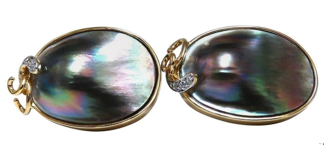 .30 Carat Natural Diamonds Black Blister Pearl Clip Earrings 14 Karat: Title: .30 Carat Natural Diamonds Black Blister Pearl Clip Earrings 14 Karat $1,200.00 PRODUCT DESCRIPTION Black Blister pearl earrings. 21 x 15mm .30ct round diamonds, G-color vs-2 14kt. yellow gold