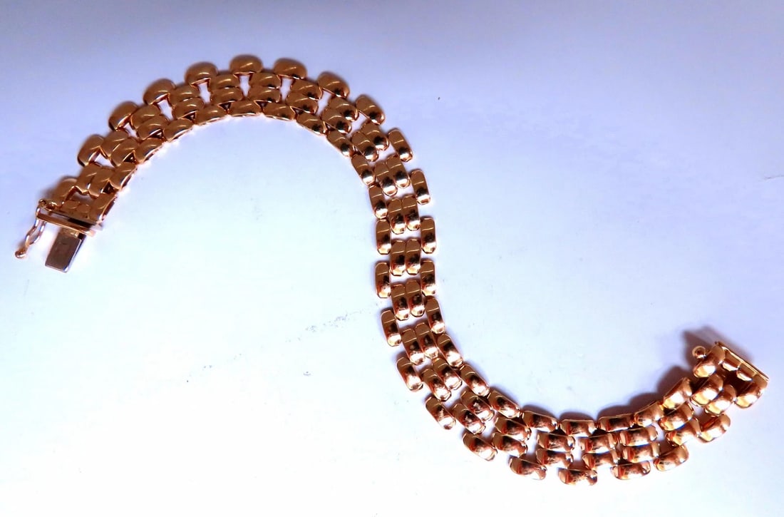 10mm Classic Panther Link Bracelet 14kt 12448: Title: 10mm Classic Panther Link Bracelet 14kt 12448 $2,000.00 PRODUCT DESCRIPTION 10mm Classic Panther Link Bracelet Classic Staggered Design 14.7 grams 14kt yellow gold Reserve: $1,840.00 Shipping: