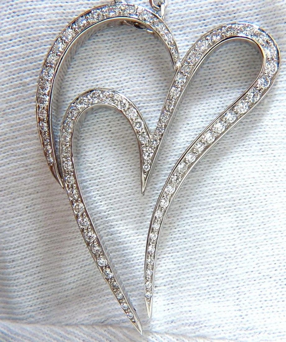 3.00ct ROUND DIAMONDS MODERN SWIRL HEARTPENDANT G / VS 14KT & CHAIN RARE 10326: Title: 3.00ct ROUND DIAMONDS MODERN SWIRL HEARTPENDANT G / VS 14KT & CHAIN RARE 10326 $5,000.00 PRODUCT DESCRIPTION Modern Love Double Heart Swirl pendant. 3.00ct. Diamonds Rounds, Full Cut Brilliants