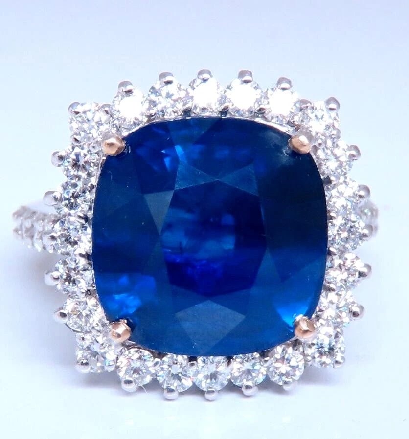 Natural Sapphire Diamonds Ring 15.94ct 18kt. GIA Certified 12233: Title: Natural Sapphire Diamonds Ring 15.94ct 18kt. GIA Certified 12233 $33,000.00 PRODUCT DESCRIPTION Classic Cluster GIA Certified 15.94ct. Natural Blue Sapphire ring. Report #: 2175627477 cushion c