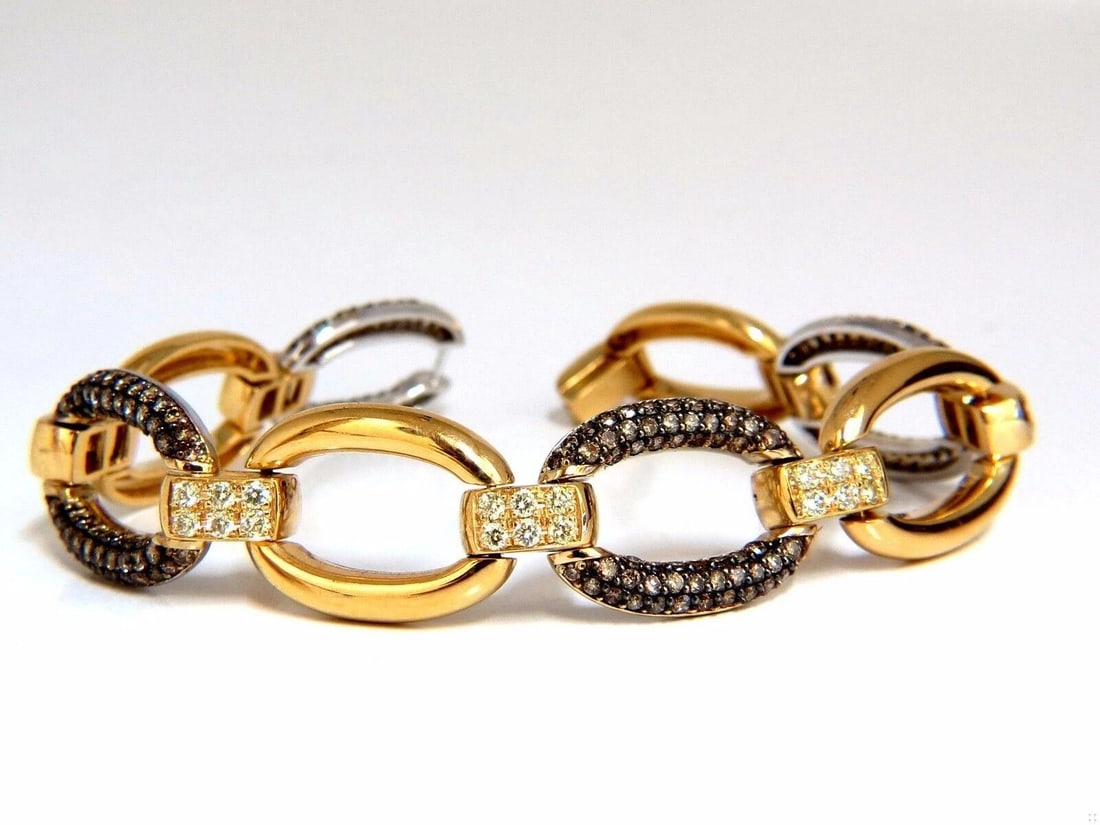 5.30ct natural fancy yellow & brown diamond link bracelet 14kt 12241: Title: 5.30ct natural fancy yellow & brown diamond link bracelet 14kt 12241 $5,000.00 PRODUCT DESCRIPTION Classic Fancy color diamonds bracelet. Oval Wide linked Hinge with intricate bead work.