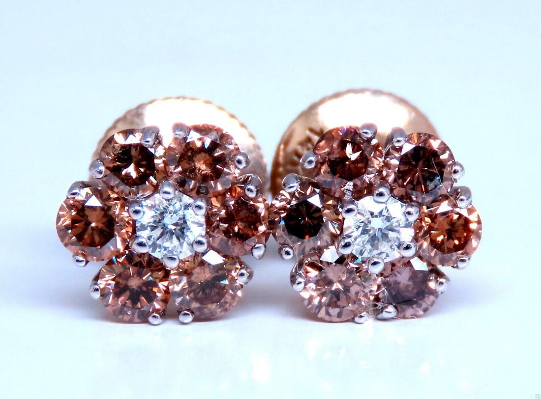 1.30ct. natural round diamond cluster earrings 14 karat Fancy Browns: Title: 1.30ct. natural round diamond cluster earrings 14 karat Fancy Browns $1,500.00 PRODUCT DESCRIPTION Cluster diamond earrings. Natural round diamonds .20ct center (2) diamonds. G-color Vs-2 clari