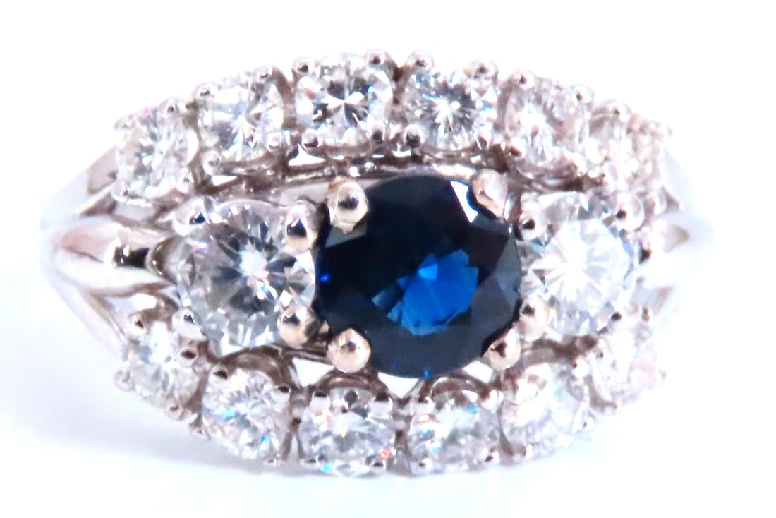.69ct Natural Sapphire Cluster Row Ring 14kt 46885: Title: .69ct Natural Sapphire Cluster Row Ring 14kt 46885 $4,500.00 PRODUCT DESCRIPTION .69ct Natural Diamond Cluster Ring Round Full Cut Brilliant. 5.4mm diameter Side (2) Diamonds .50ct Outer Diamon