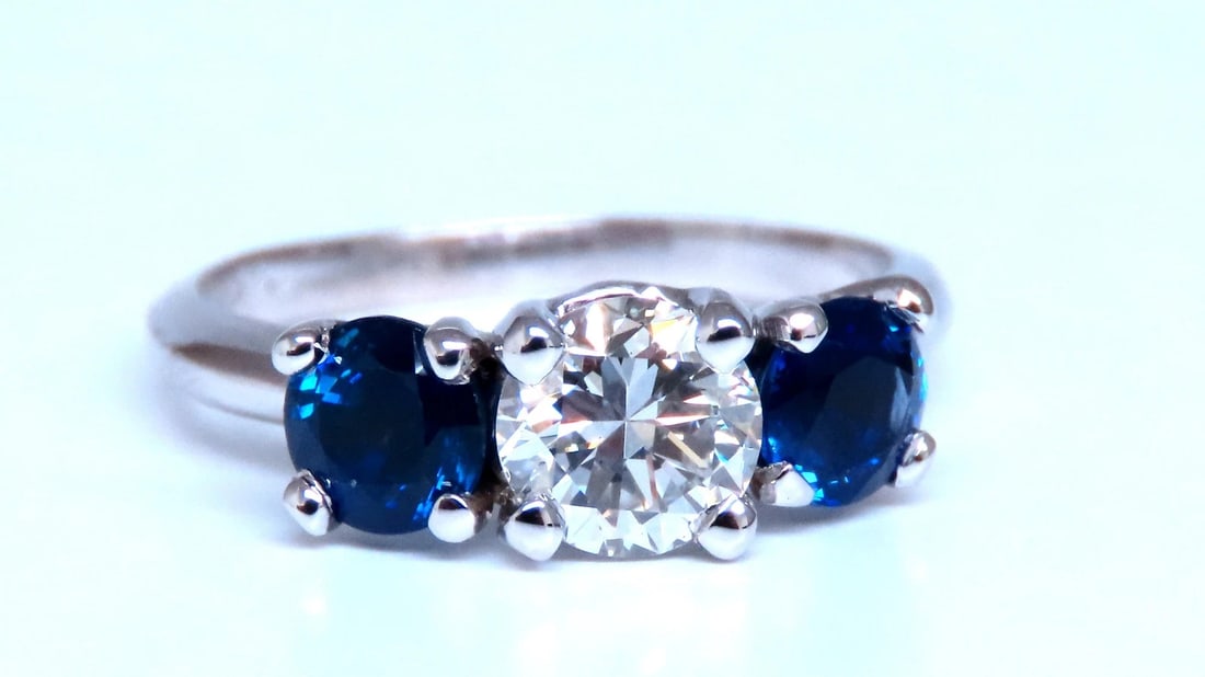 GIA Certified .82ct Natural Diamond Sapphire Three Stone Ring 14kt 54417: Title: GIA Certified .82ct Natural Diamond Sapphire Three Stone Ring 14kt 54417 $6,500.00 PRODUCT DESCRIPTION GIA certified .82ct natural round diamond ring G-color vs-1 clarity Report 6234279908 .80c