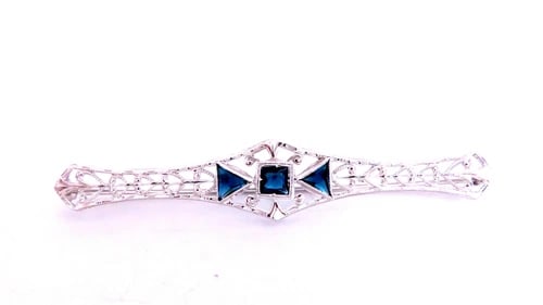 0.60ct Lab Sapphires Edwardian Revisit Deco Pin / Hair Clip 45411: Title: 0.60ct Lab Sapphires Edwardian Revisit Deco Pin / Hair Clip 45411 $450.00 PRODUCT DESCRIPTION 0.60ct Lab Sapphires clean clarity and transparent triangle and cushion cut 56mm long 10mm wide 14k