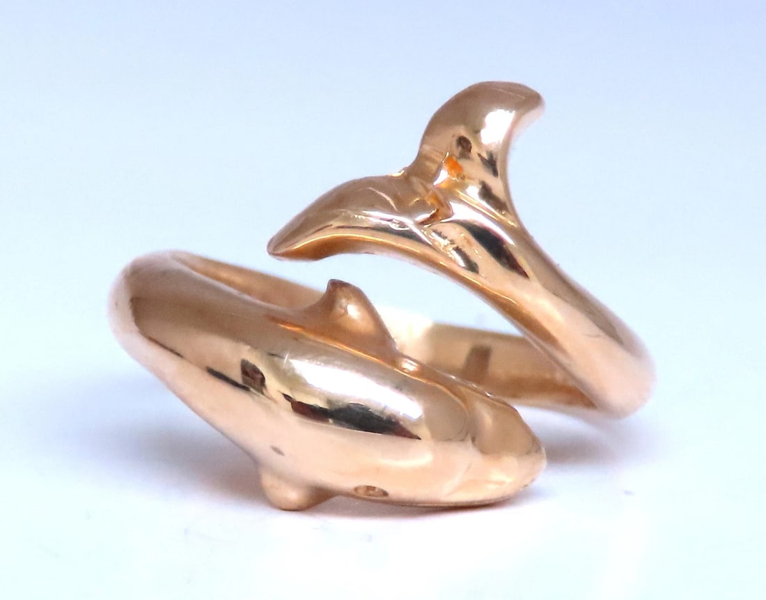 Dolphin Crossover Wrap Ring 14kt Gold 12546: Title: Dolphin Crossover Wrap Ring 14kt Gold 12546 $550.00 PRODUCT DESCRIPTION Dolphin Crossover Wrap Ring still life 3D dolphin 15mm wide 5mm depth size 7.5 14kt yellow gold 3.2 grams Reserve: