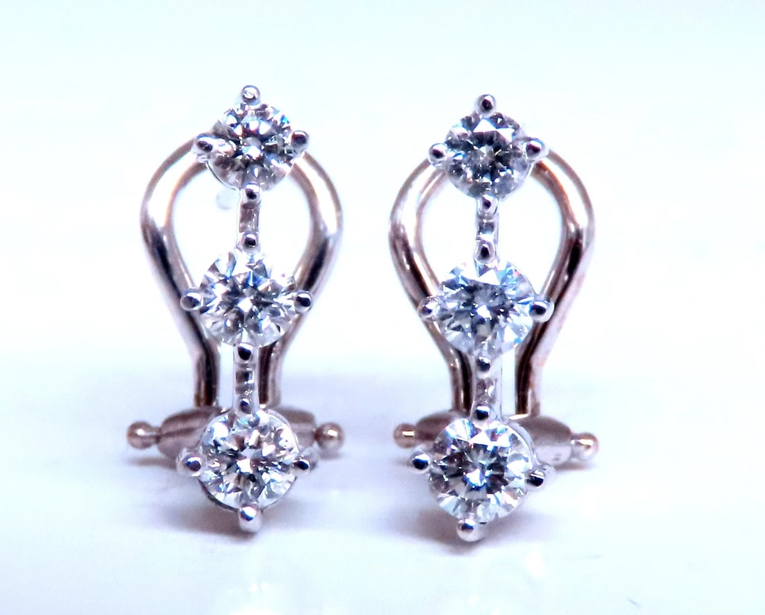 .70ct Three Stack Diamond clip Earrings 14kt 12493: Title: .70ct Three Stack Diamond clip Earrings 14kt 12493 $1,300.00 PRODUCT DESCRIPTION .70ct natural diamonds round full cuts brilliant g-color si-1 clarity 14kt white gold omega clip