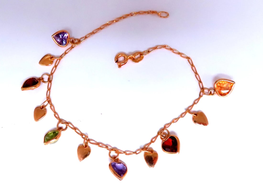 Garnet Amethyst Citrine Heart Dangle Bracelet 14kt 12461: Title: Garnet Amethyst Citrine Heart Dangle Bracelet 14kt 12461 $600.00 PRODUCT DESCRIPTION 4ct natural garnet, amethyst, citrine, peridot, bracelet 6 x 6 mm each 14kt yellow gold 7 inches long <