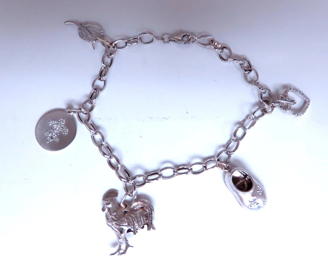 Assorted Charms Diamonds Bracelet Rooster 14kt Gold 12445: Title: Assorted Charms Diamonds Bracelet Rooster 14kt Gold 12445 $1,800.00 PRODUCT DESCRIPTION Assorted 5 Charm Bracelet Heart: 12 x 24mm Shoe: 9 x 14mm Rooster 19 x 18mm Damask Charm 14mm