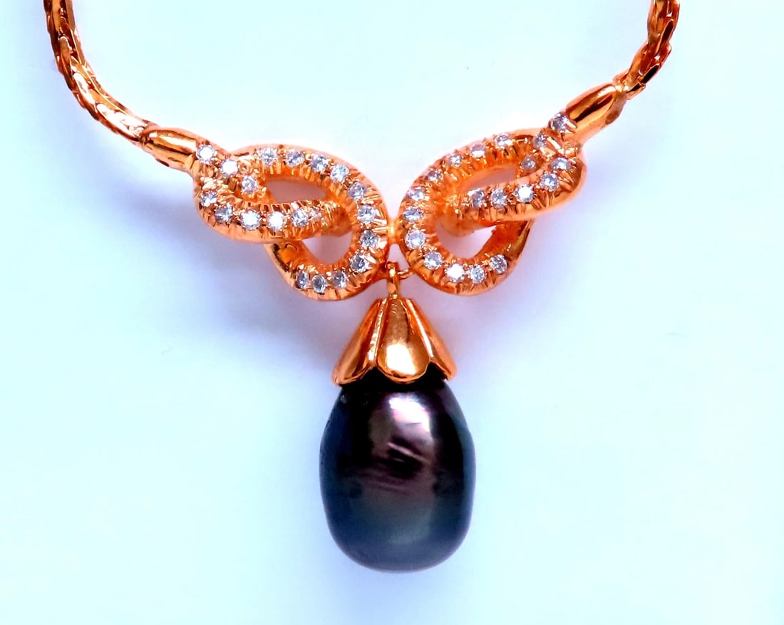 11.8mm Natural South Sea Pearl Dangle Necklace 14kt 12405: Title: 11.8mm Natural South Sea Dangle Necklace 14kt 12405 $1,800.00 PRODUCT DESCRIPTION 11.85mm Natural South Sea Peacock Pearl Necklace .80ct Natural Round Diamonds G H Color Vs-2 Clarity 14kt