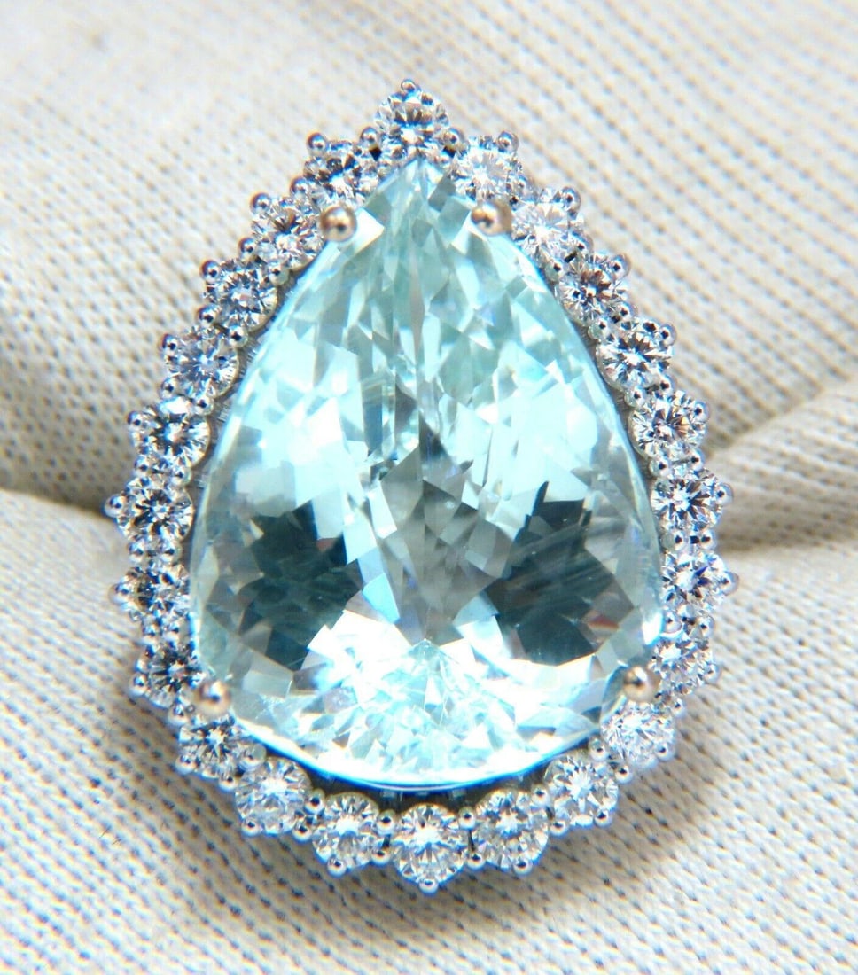 GIA Certified 29.31ct Natural Pear Shaped Aquamarine Diamonds Ring 14kt 12399: Title: GIA Certified 29.31ct Natural Pear Shaped Aquamarine Diamonds Ring 14kt 12399 $7,500.00 PRODUCT DESCRIPTION Pear Shaped Aquamarine Halo Classic GIA Certified 29.31ct. Natural Aquamarine ring.