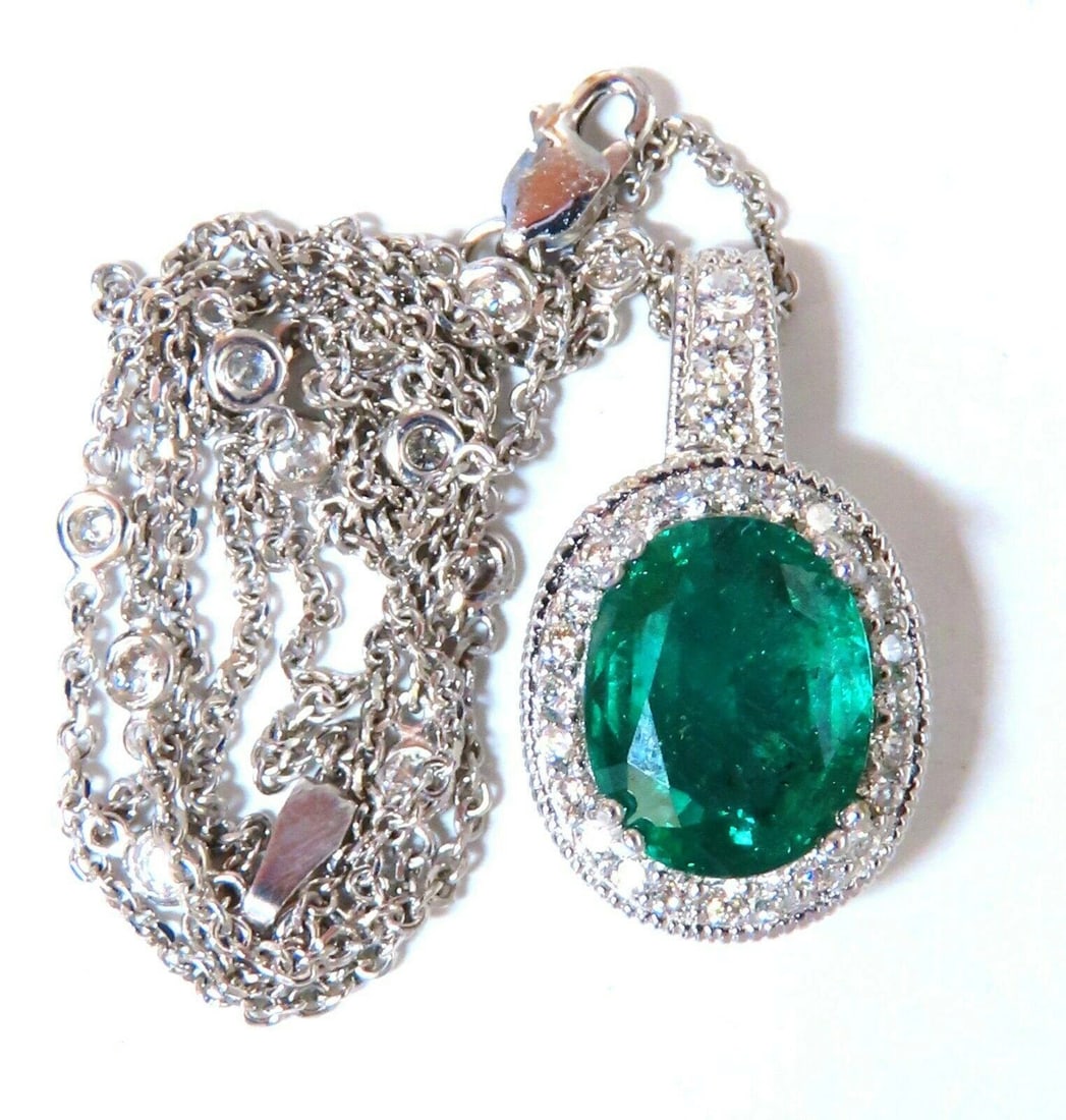 GIA Certified 4.63ct Natural Emerald Diamonds Necklace 14kt gold 11253: Title: GIA Certified 4.63ct Natural Emerald Diamonds Necklace 14kt gold 11253 $9,000.00 PRODUCT DESCRIPTION GIA Certified Natural emerald necklace 4.63ct. Natural emerald & 2.76ct diamonds necklace.
