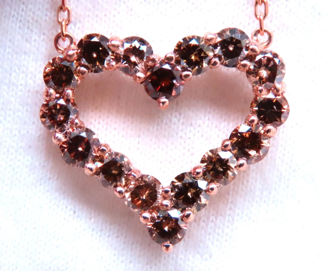 2.20ct Natural Fancy Brown Diamonds Heart Necklace 14kt Gold 12396: Title: 2.20ct Natural Fancy Brown Diamonds Heart Necklace 14kt Gold 12396 $1,400.00 PRODUCT DESCRIPTION 2.20ct Natural Fancy Brown Diamonds Open Heart Necklace Vs-2 Clarity. 17 inch 14kt rose gold