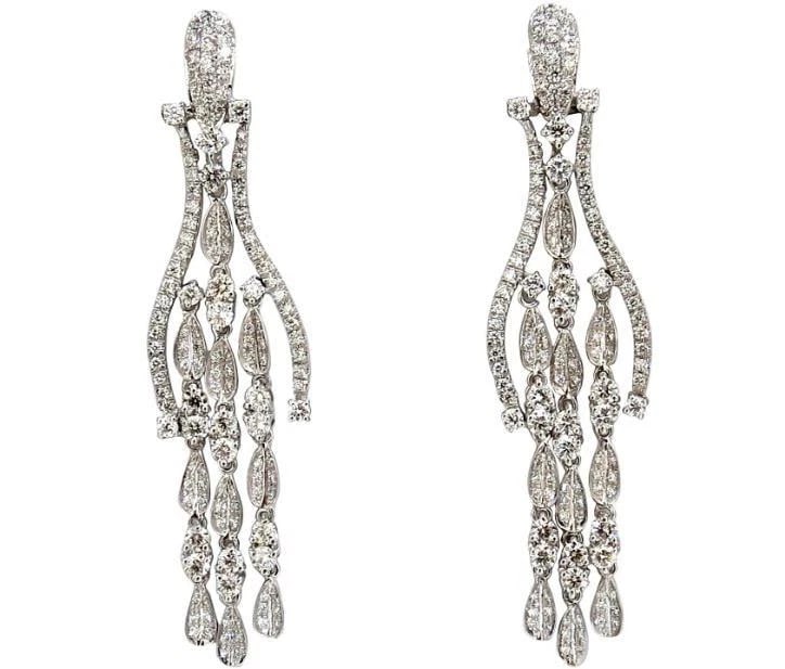 6.00ct natural diamonds modern dangle petal chandelier earrings 18kt 12321: Title: 6.00ct natural diamonds modern dangle petal chandelier earrings 18kt Ref 12321 $9000.0 PRODUCT DESCRIPTION 3D Pattern Wishbone & Elegant Petal Dangles. Modern long chandelier Dangle earrings.