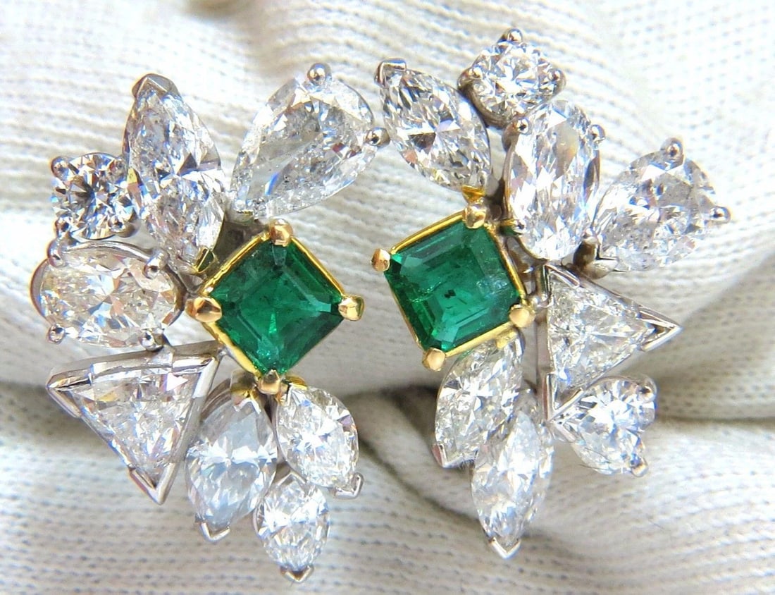 10.90ct Natural Emerald Diamond Crescent Cocktail Earrings Ref 12317: Title: 10.90ct Natural Emerald Diamond Crescent Cocktail Earrings Ref 12317 $26000.0 PRODUCT DESCRIPTION Victorian Premier 1.80ct. Natural (2) Emerald Earrings Emerald cut, Brilliants. clean clarity