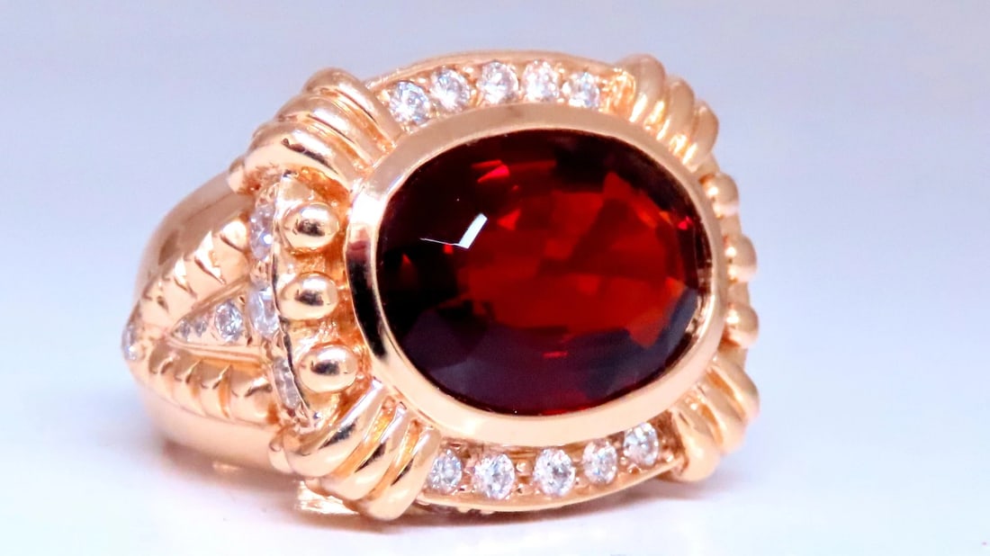 Natural Spessartite Diamonds Ring Bead Goth Stud 14Kt Gold Ref 12297: Title: Natural Spessartite Diamonds Ring Bead Goth Stud 14Kt Gold Ref 12297 $1500.0 PRODUCT DESCRIPTION Natural Diamonds Spessartite Cocktail Cluster Ring 15ct Natural Spessartite Garnet Oval cut, 13