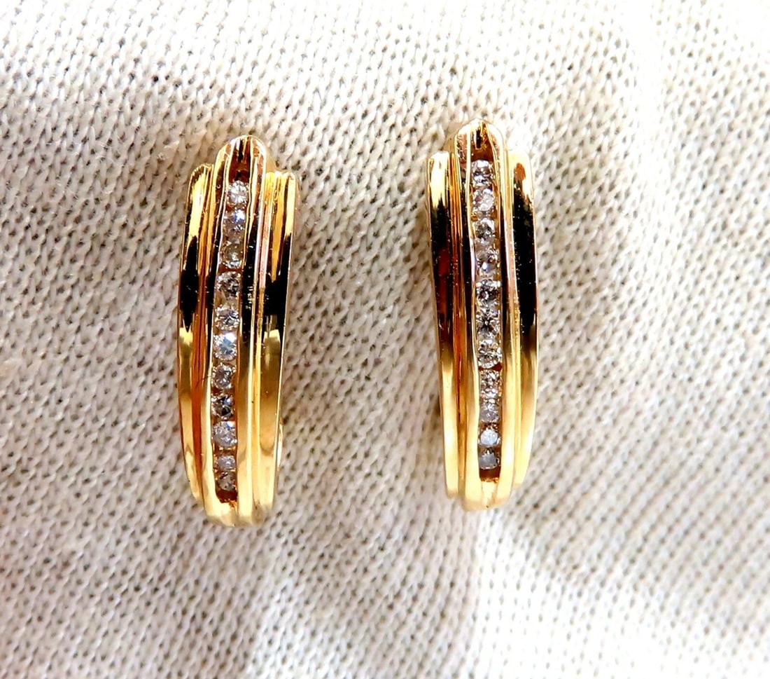 .22ct Diamonds Semi Hoop Earrings 14kt: MAGNIFICENT JEWELS Diamond Semi Hoop .22ct. Natural Diamonds: Rounds, full cuts I-color, Si-1 clarity 3.9 grams 14Kt. yellow gold. Overall: .75 inch long Comfortable Butterfly All Items come with a
