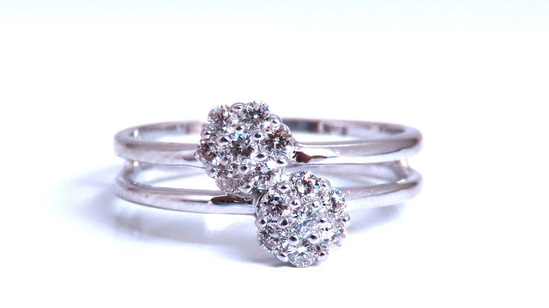 Double Cluster .26ct natural diamonds 18kt gold ring: .26ct ttw Natural Diamonds Cut Diamond Ring vs-2 clarity G color. 14kt white gold 2.6 Grams Depth: 3.5mm Ring is 9mm wide Current ring size: 6.5 May professionally resize, please inquire. All Items