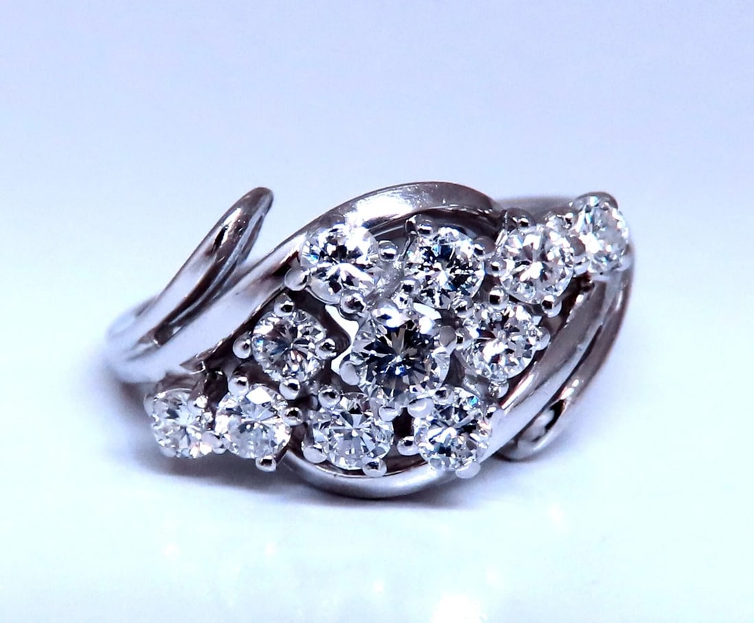 Vintage Natural Diamond ring .80ct 14kt Gold Raised Cathedral Cluster: .80ct Natural round Cut Diamond Ring vs-2 clarity G color. 14kt white gold 5.5 Grams Depth: 9.8mm Ring is 11mm wide Current ring size: 8.25 May professionally resize, please inquire. $4500 appraisal