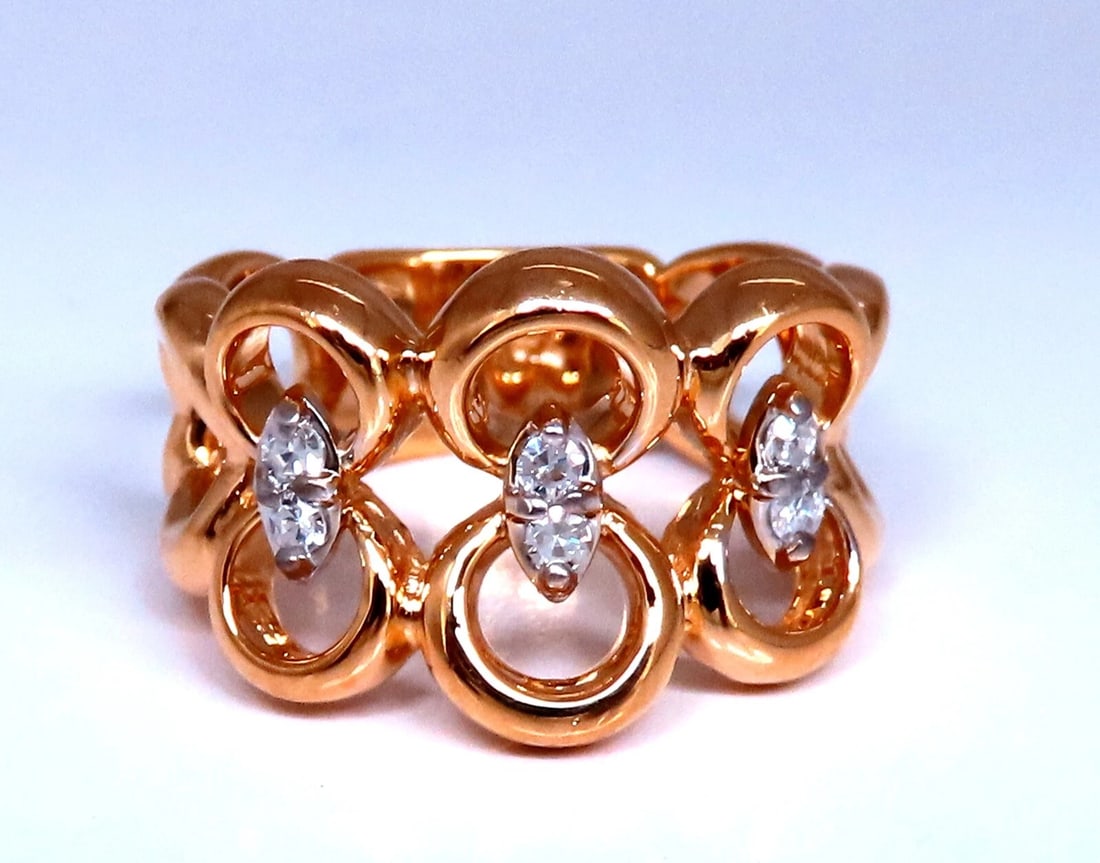 .20ct Natural Diamonds Circles Loop ring 14kt Gold: Circles Looping Ring .20ct. Natural Round diamonds eternity ring G color Vs-2 clarity Very good Cuts / Full cut Brilliants 14kt. yellow gold. Ring size: 7 We may resize. Ring is 13mm wide 8.8 Grams. A