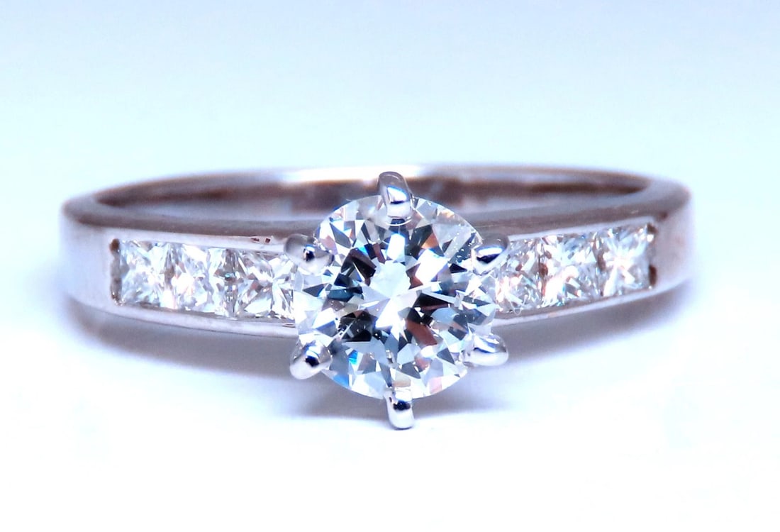 GIA Certified .58ct Natural Round Diamond solitaire ring G/Vs1: GIA certified .58 carat solitaire diamond ring. Report number 6223327871 Stating the G Color Vs1 clarity No fluorescence. 14kt gold 2.4gms Size 4 and we may resize. Depth of ring 6mm $8,000 appraisal