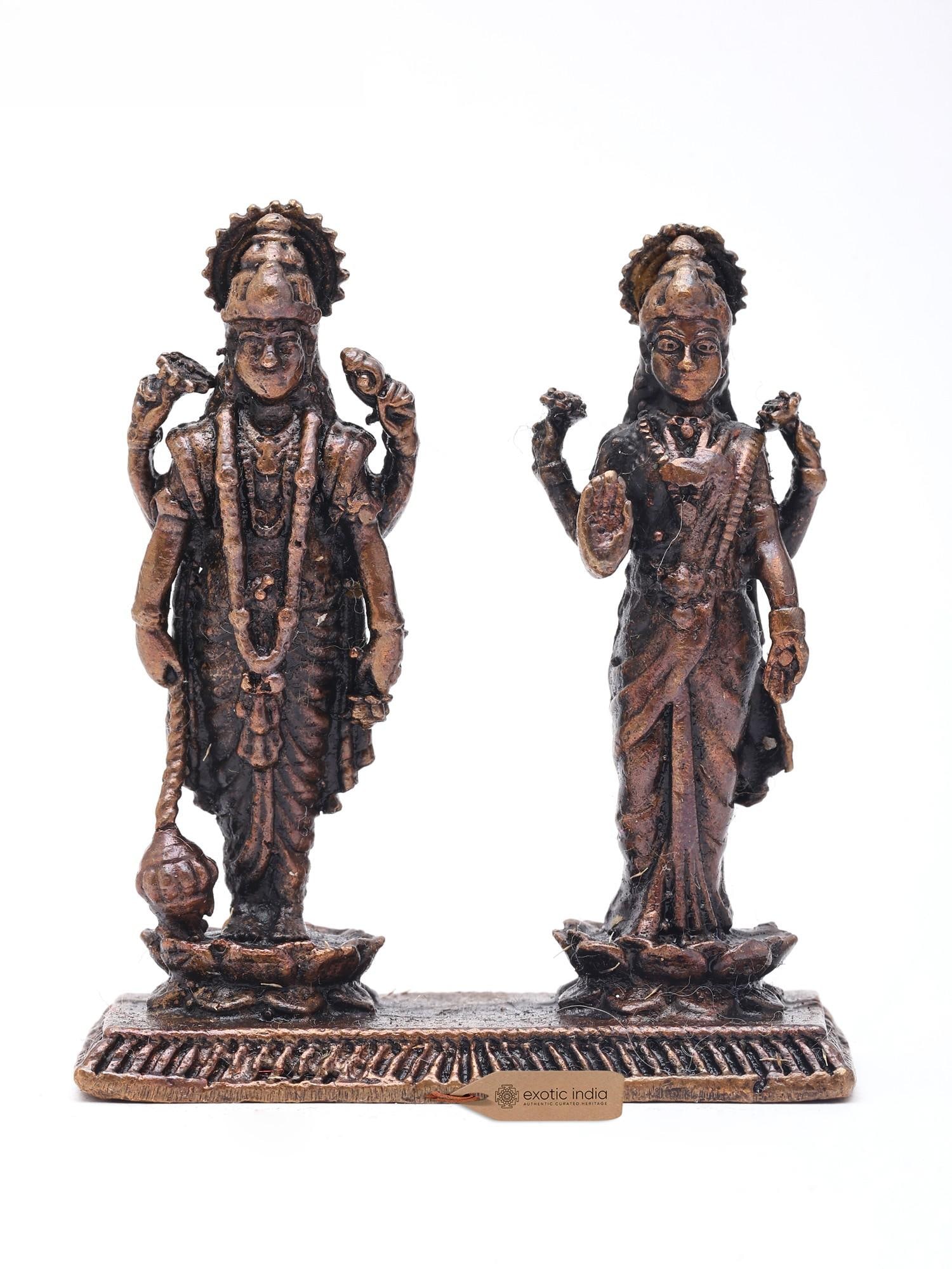2" Small Four Armed Lakshmi and Narayan Standing on Lotus | Handmade | Copper Statue: Description: 2" Small Four Armed Lakshmi and Narayan Standing on Lotus | Handmade | Copper Statue