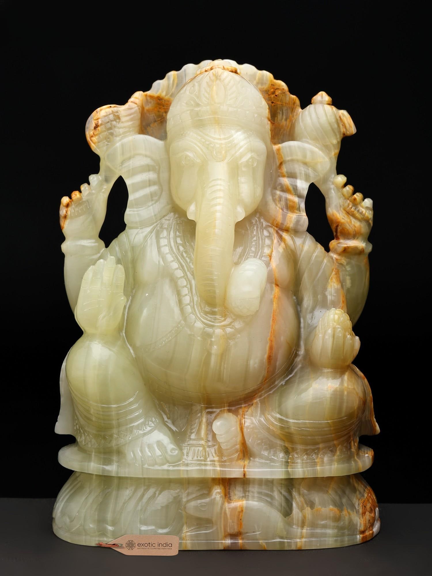 7" Chaturbhuj Lord Ganesha Seated on Lotus Asana with Mushak | Yellow Calcite Gemstone: Description: 7" Chaturbhuj Lord Ganesha Seated on Lotus Asana with Mushak | Yellow Calcite Gemstone
