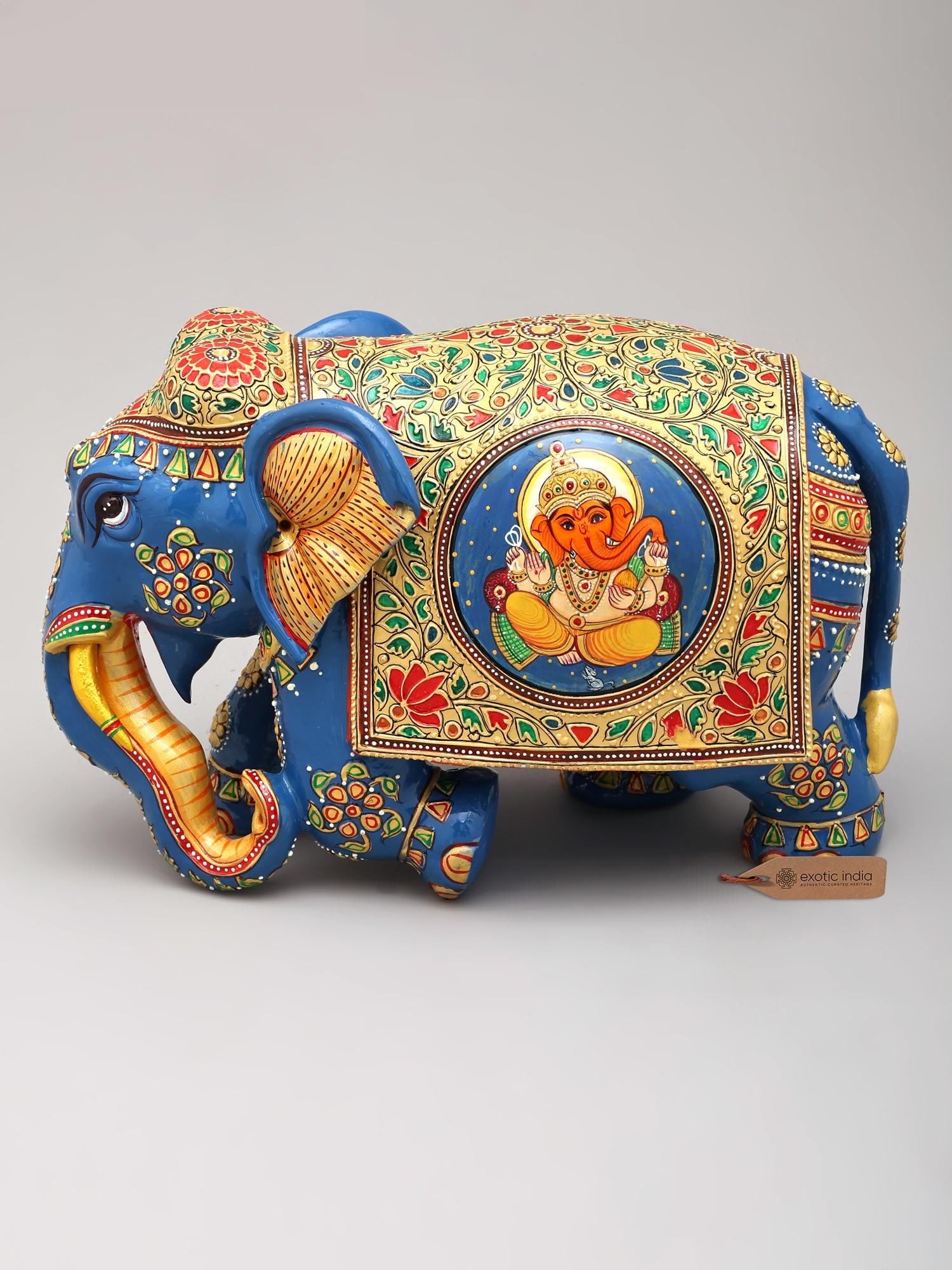10" Hand-Painted Blue Elephant Sculpture with Lord Ganesha Artwork | Home Decor Wood Figurine: Description: 10" Hand-Painted Blue Elephant Sculpture with Lord Ganesha Artwork | Home Decor Wood Figurine
