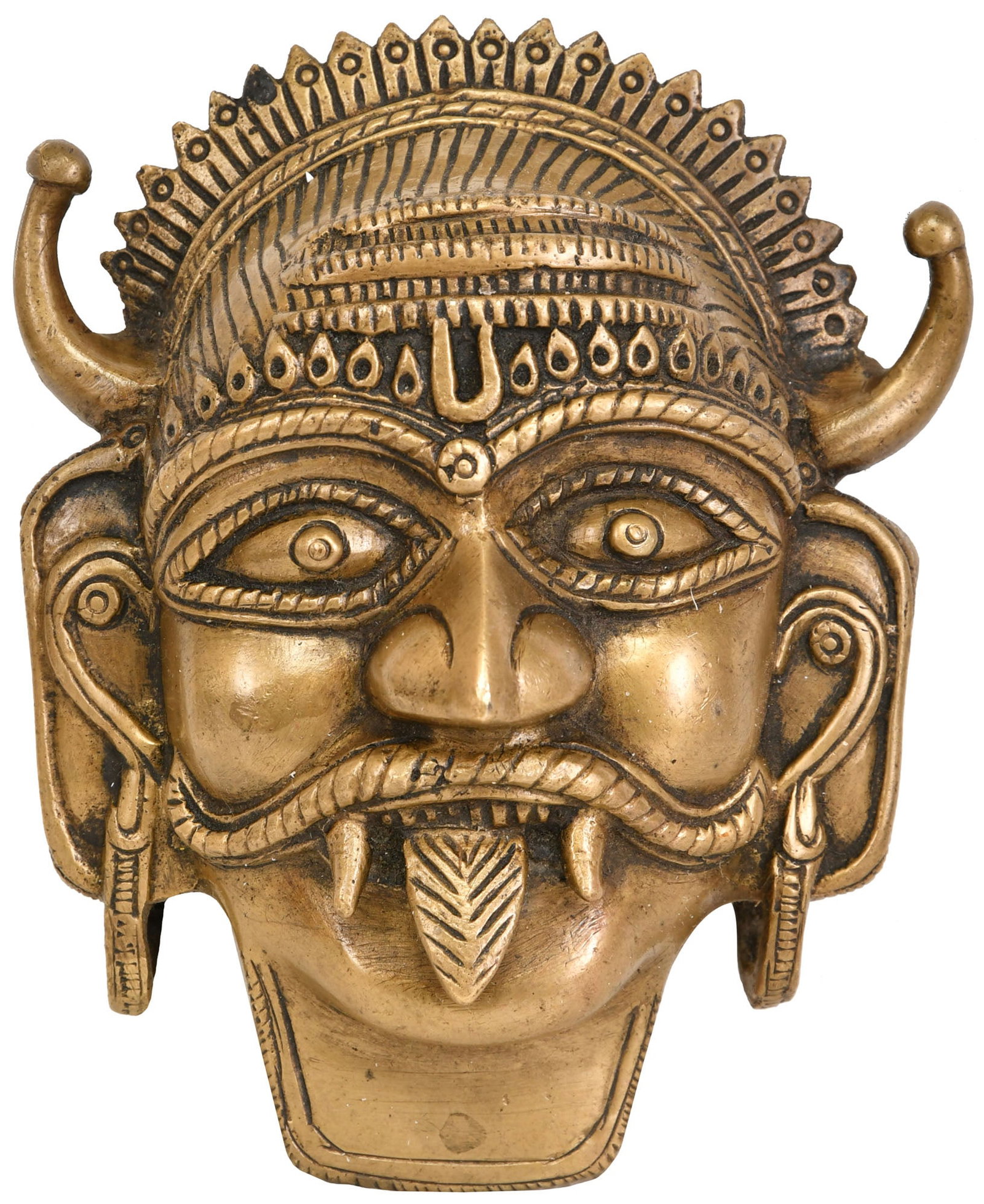 5" Bhairava Wall Hanging Mask in Brass | Handmade | Made In India: Description: See It In Your Home Forged from the finest brass, each contour and detail of this mask is sculpted with devotion, breathing life into the very essence of Bhairava's raw energy. The rich,