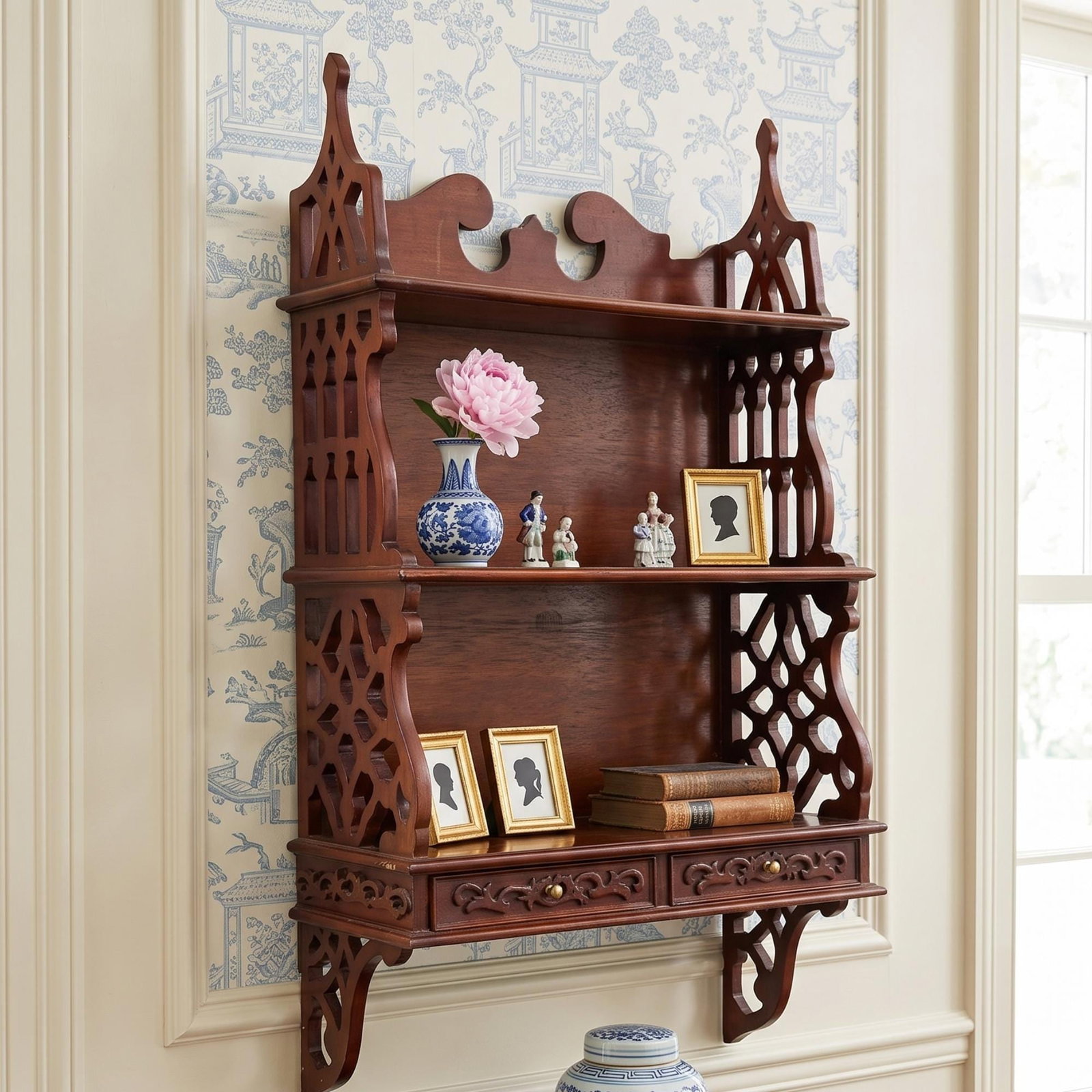 1970 Large Wood Wall Shelf Mahogany Chinoiserie Chippendale Etagere Curating Living Room: This 1970s Wood Chippendale wall shelf is a mahogany-toned, three-tier fretwork etagere for curating ginger jars, books, and collected objects. Chinese Chippendale wall shelf with three graduating dis