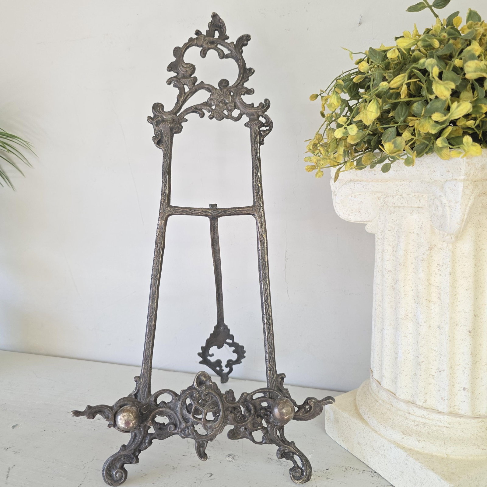 1940s Silver Easel Display Art Picture Holder for Ornate Rococo Revival Shelf Styling: 1940s Silver plate Display Easel in a Iconic Art Nouveau Style. Scrollwork that catches the eye. Not every beautiful piece is polished. Some of the most compelling ones have been left exactly as time