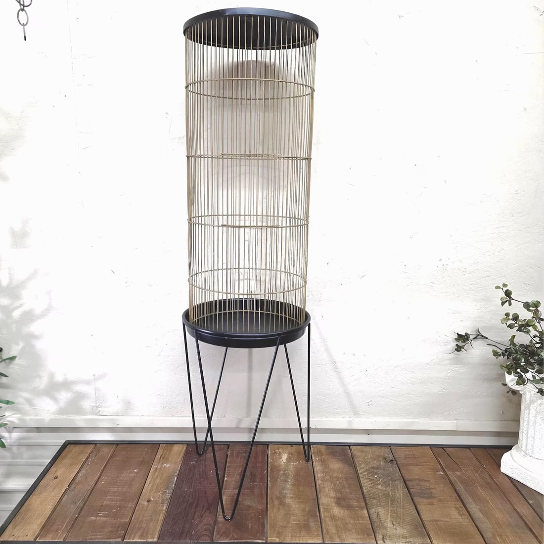 Gold Wire Birdcage on Stand, Hollywood Regency Plant Terrarium Display: At 48 inches tall, this gold wire birdcage on a floor stand commands attention without competing for it — the kind of piece a room is arranged around. DETAILS AT A GLANCE Height: 48" overall (cage +